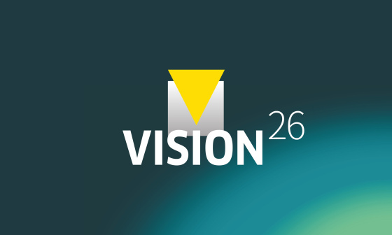 蓝绿色背景上印有VISION26字样的图形。